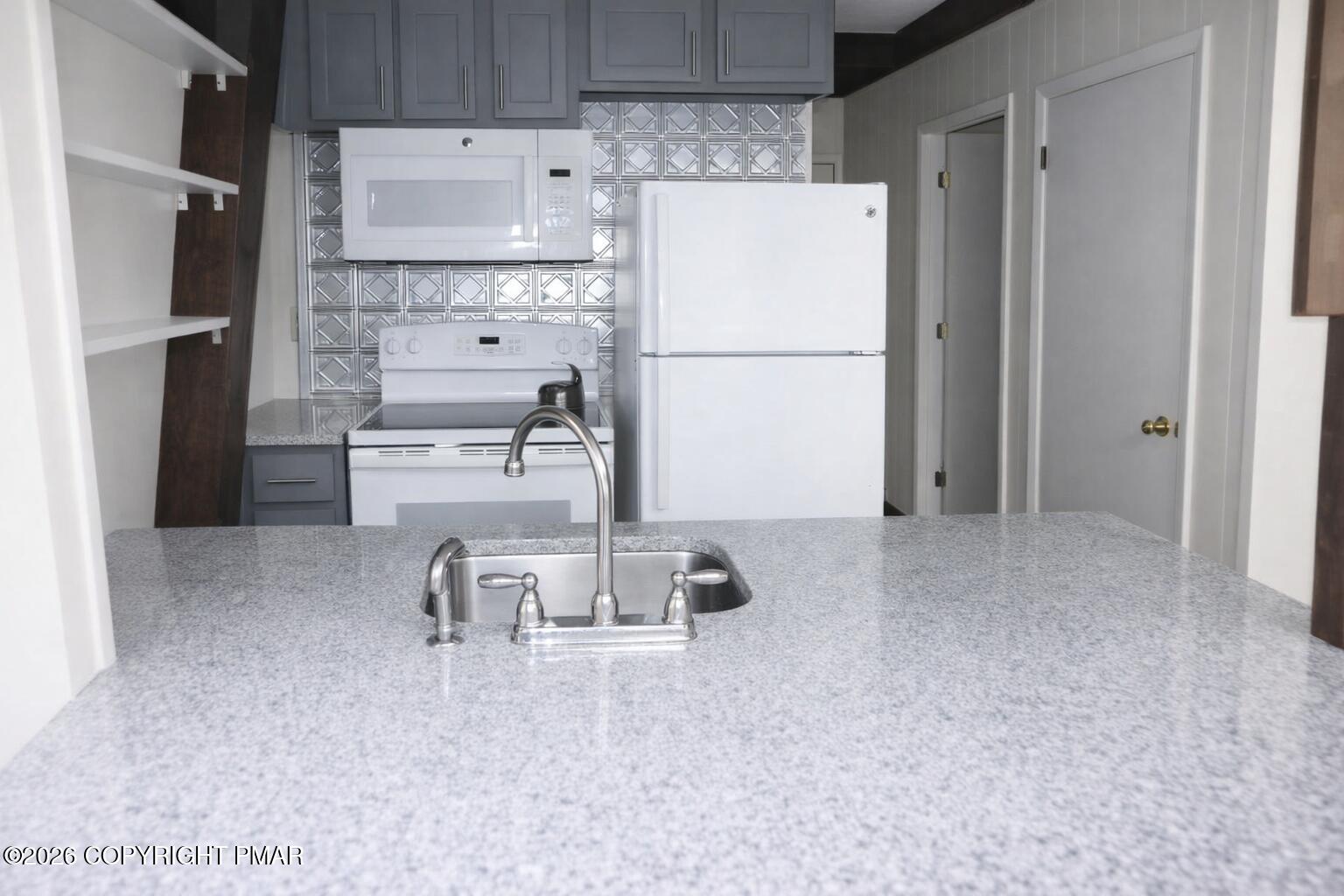 1635 Ridgeview Drive Lake Ariel, PA 18436 - Photo 4 of 16 a room with furniture a refrigerator and a sink