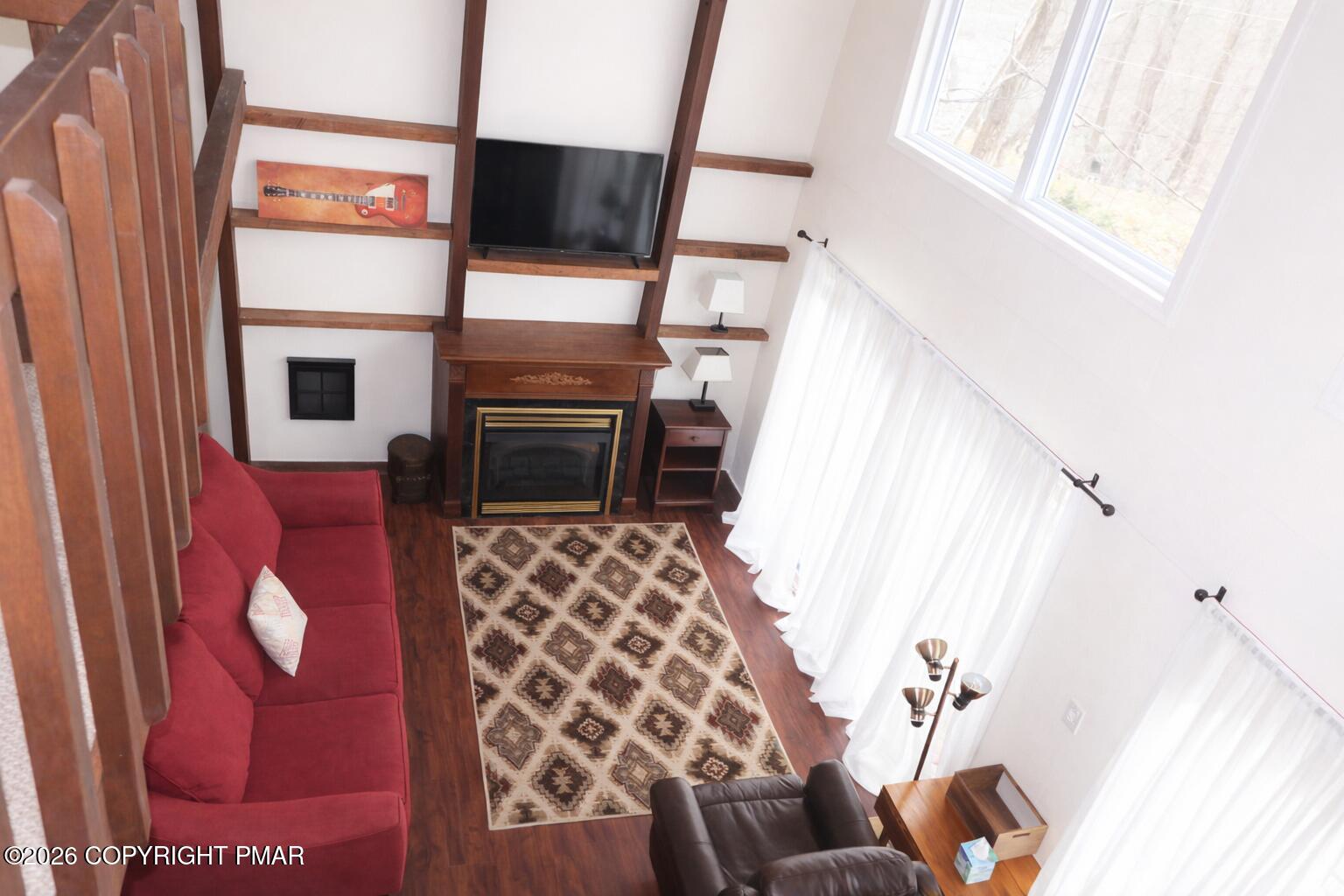 1635 Ridgeview Drive Lake Ariel, PA 18436 - Photo 8 of 16 a living room with furniture and a flat screen tv