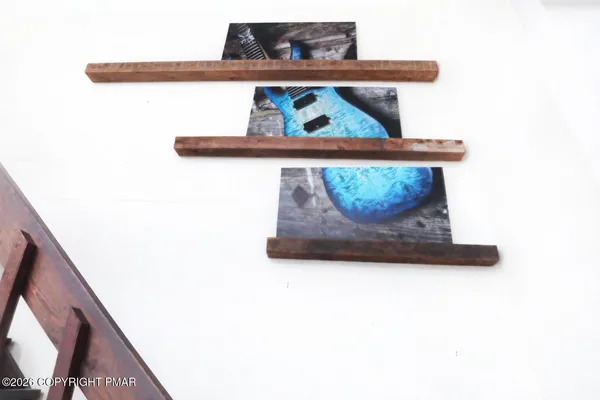 a view of staircase with white walls