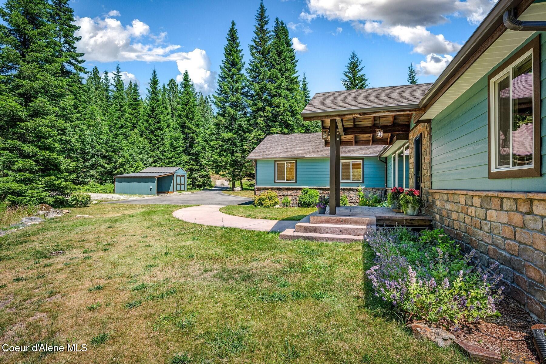 218 Topaz Trail Sandpoint, ID 83864 - Photo 64 of 70 065_Landcaped Planters, Sidewalk