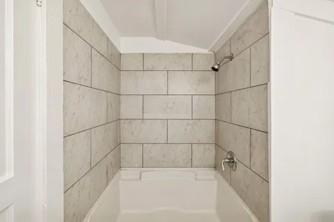 a bathroom with a bathtub