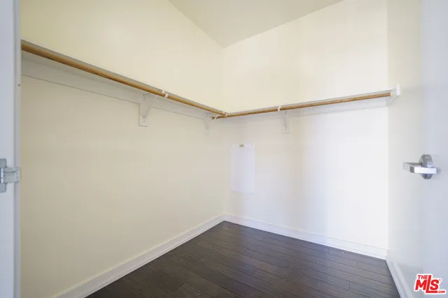 a view of an empty walk in closet