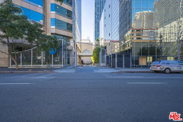 a view of a street with cars