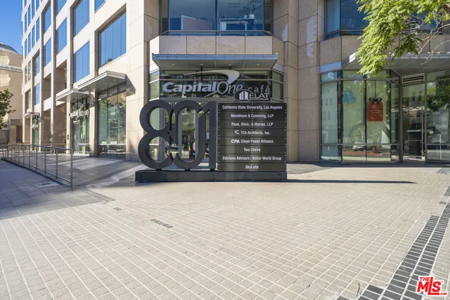 a front view of a building with glass windows