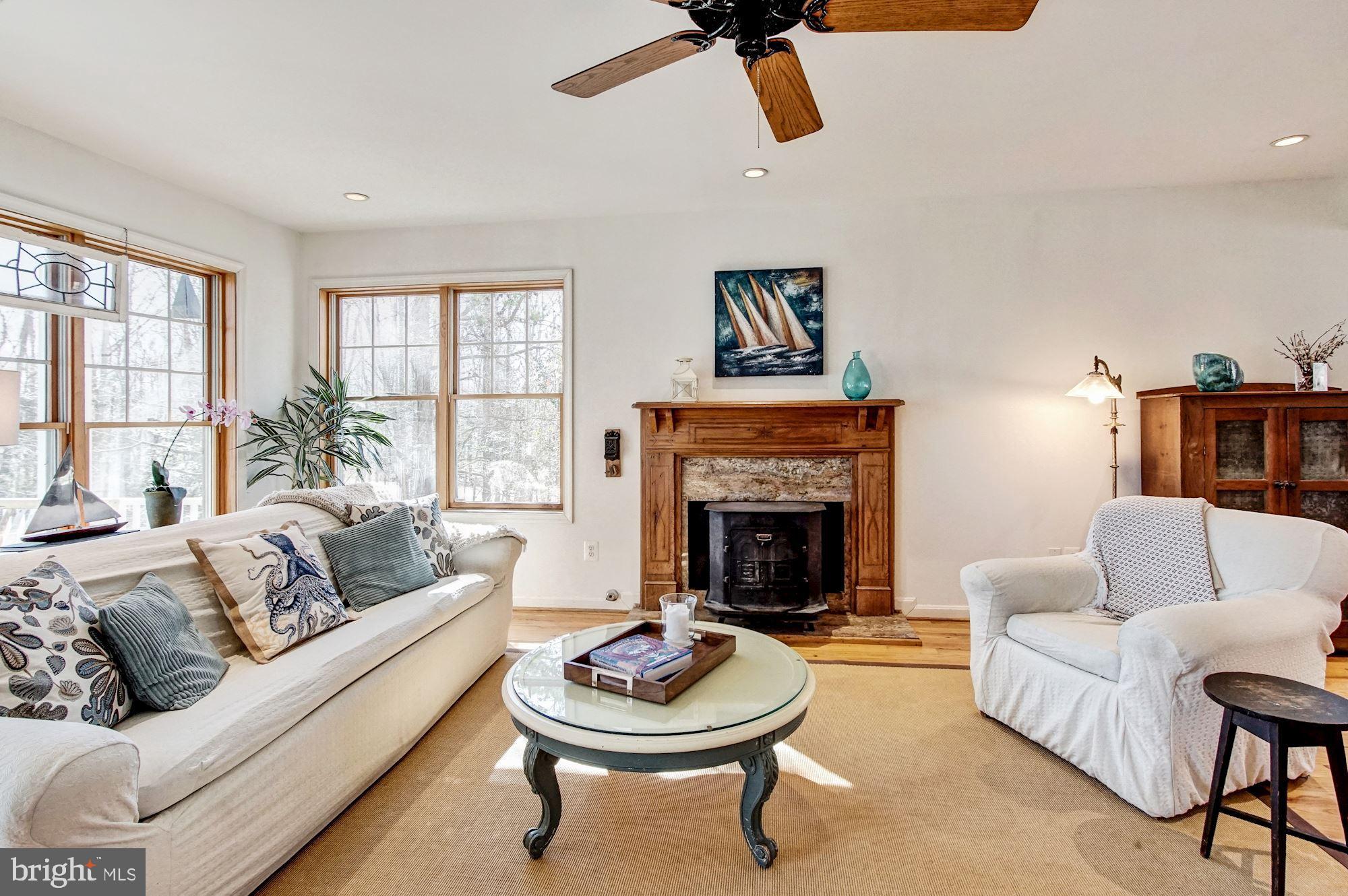 1580 Columbia Beach Road Shady Side, MD 20764 - Photo 11 of 47 Wood burning stove stays but fp is set up for gas