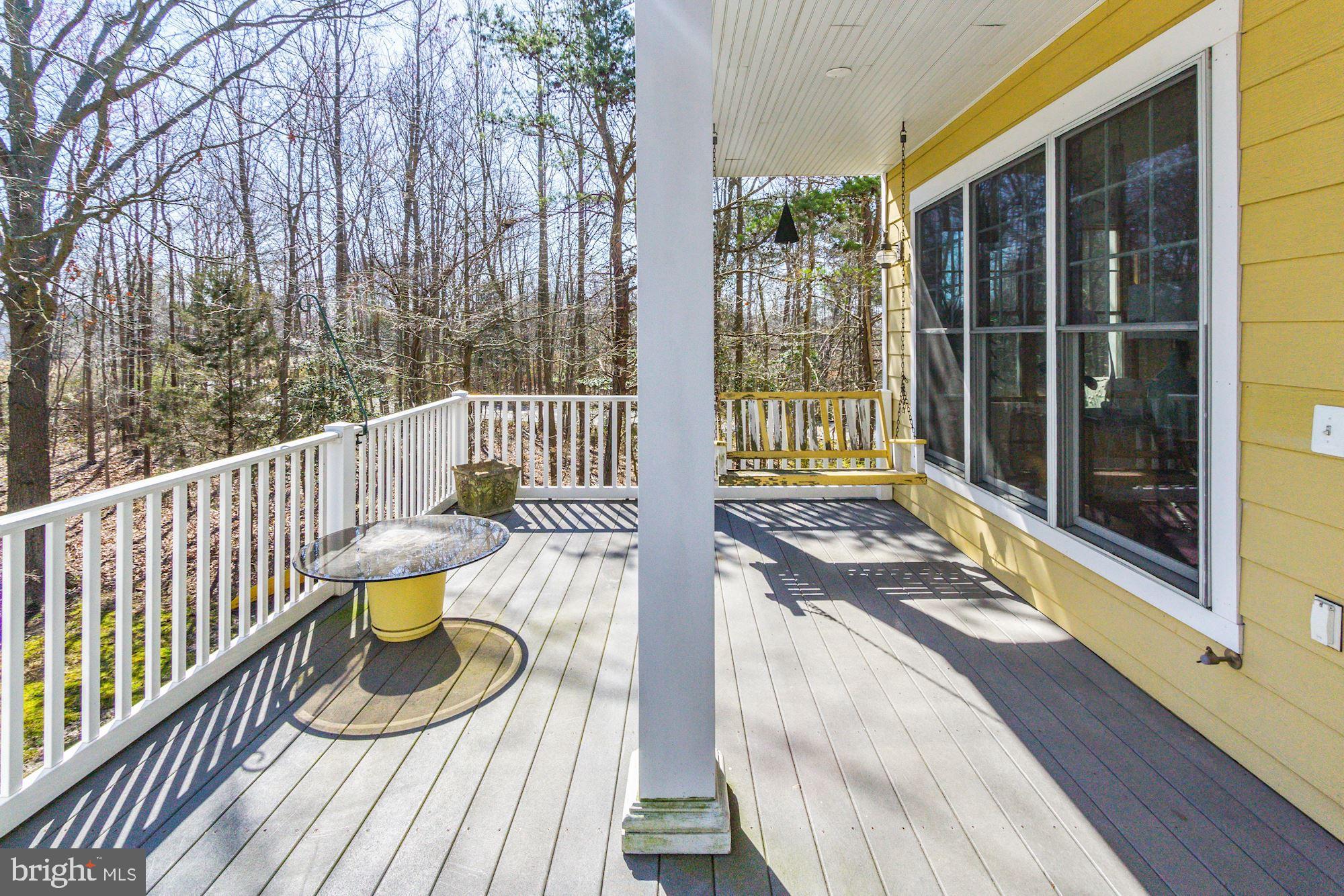 1580 Columbia Beach Road Shady Side, MD 20764 - Photo 24 of 47 Main level deck- windows to living rm