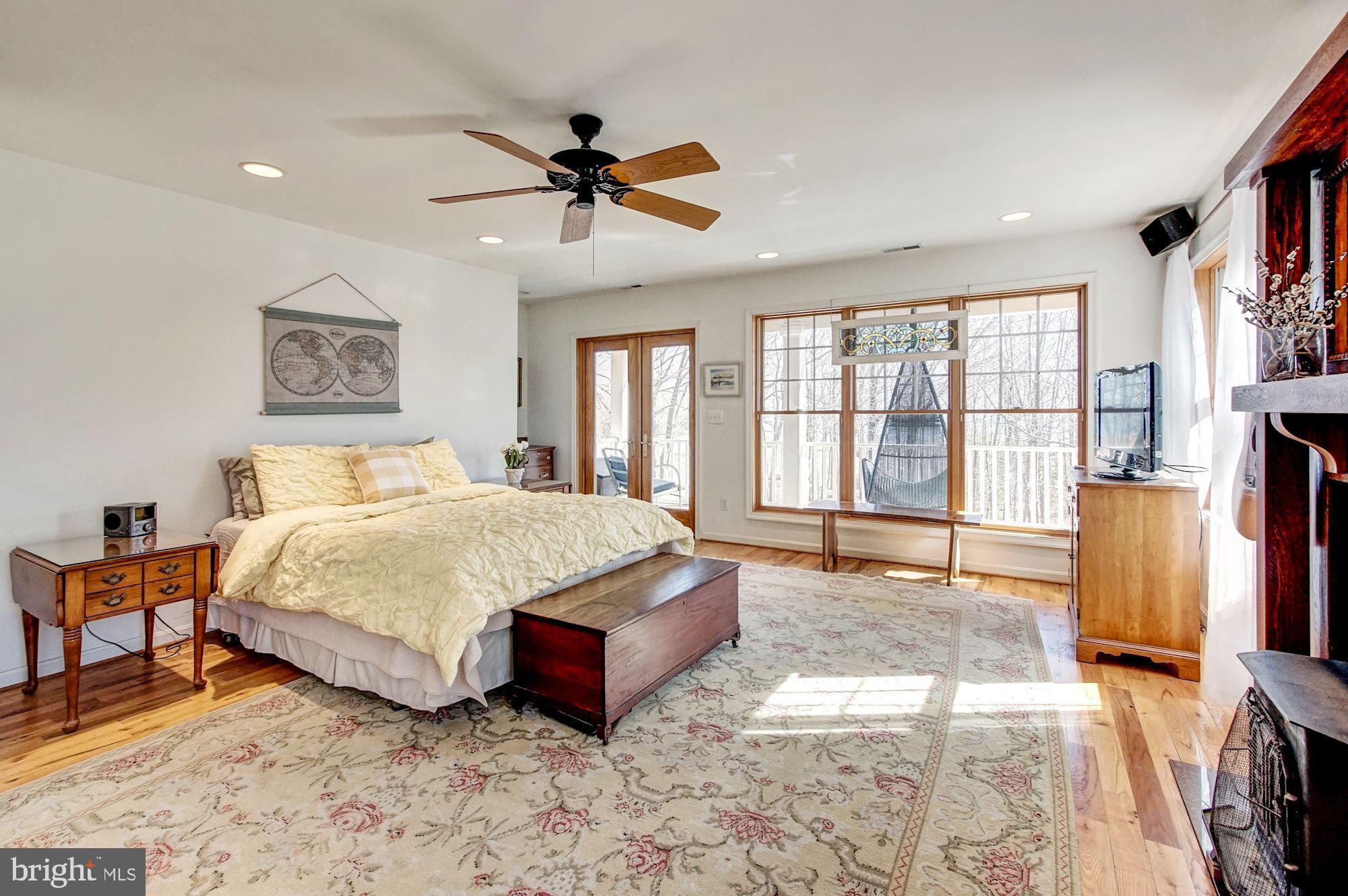 1580 Columbia Beach Road Shady Side, MD 20764 - Photo 34 of 47 Master bedroom with deck over looking bay and land