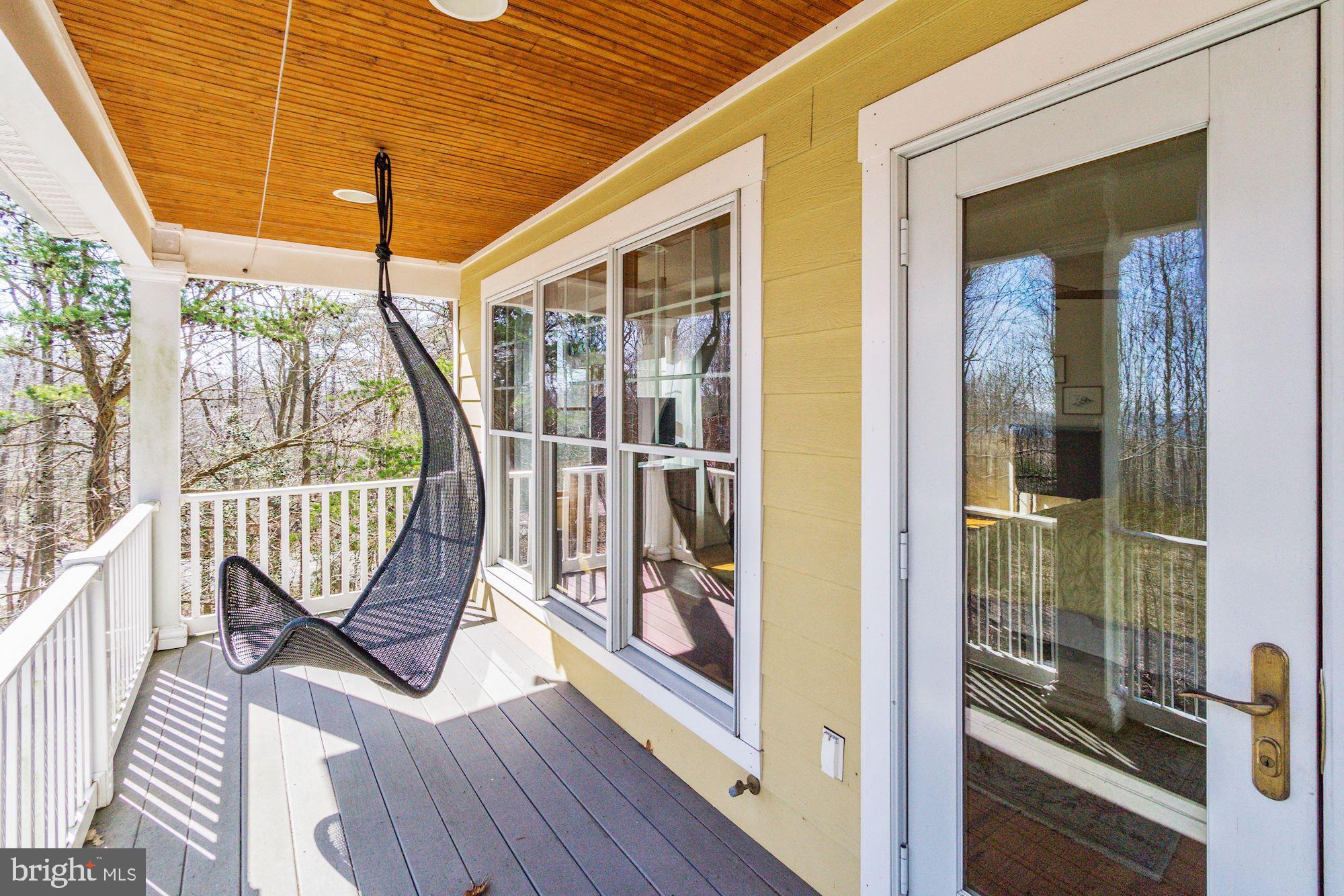 1580 Columbia Beach Road Shady Side, MD 20764 - Photo 40 of 47 Porch swing on upper deck