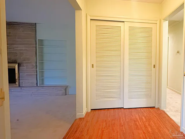 a view of a room that has a window in it