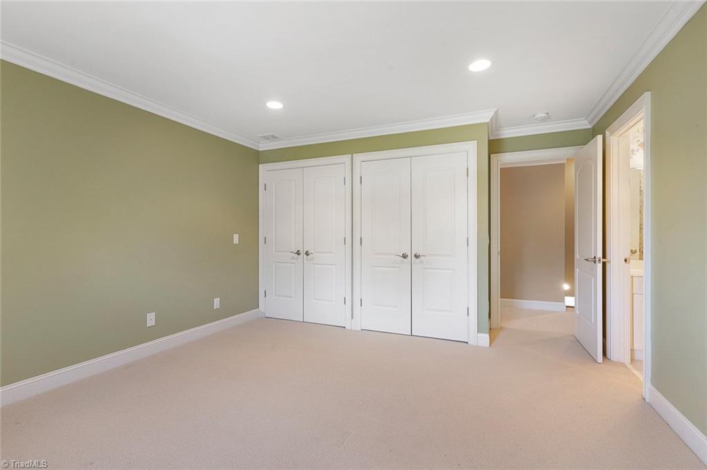 4237 Rock Bridge Road High Point, NC 27262 - Photo 21 of 30 Bedroom with double closets, full bath and walk-in closet