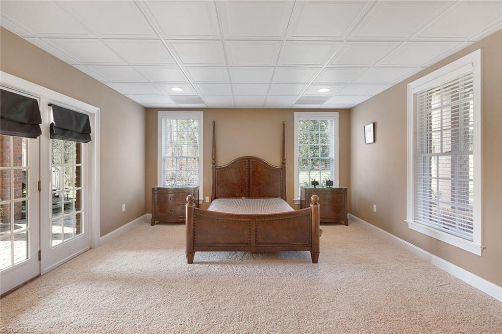 4237 Rock Bridge Road High Point, NC 27262 - Photo 24 of 30 Lower level bedroom with full bath. Opens to covered patio.