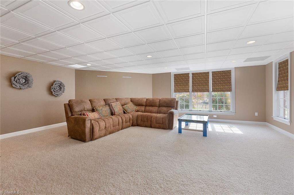 4237 Rock Bridge Road High Point, NC 27262 - Photo 26 of 30 Large den on lower level. Opens to patio.