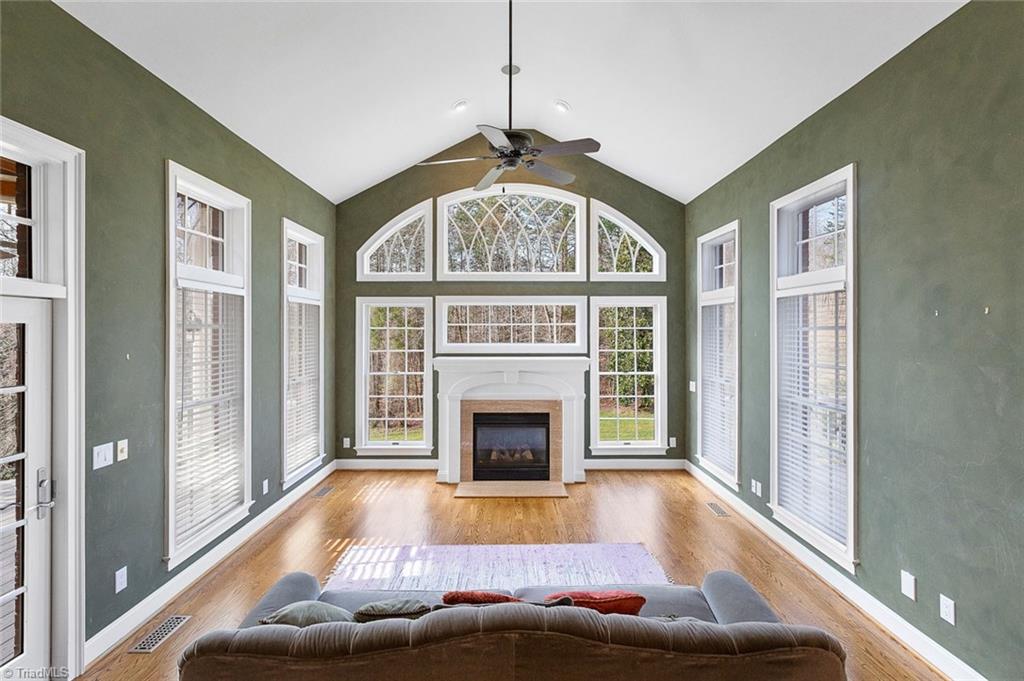 4237 Rock Bridge Road High Point, NC 27262 - Photo 9 of 30 Gorgeous Sunroom with fireplace that opens to deck.