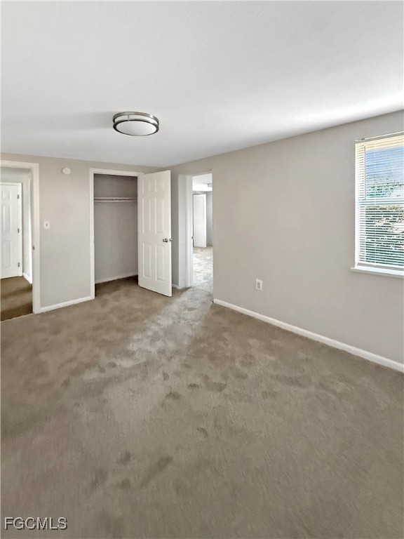 204 2nd Street, Unit 1 Fort Myers, FL 33907 - Photo 7 of 8 an empty room with windows and cabinet