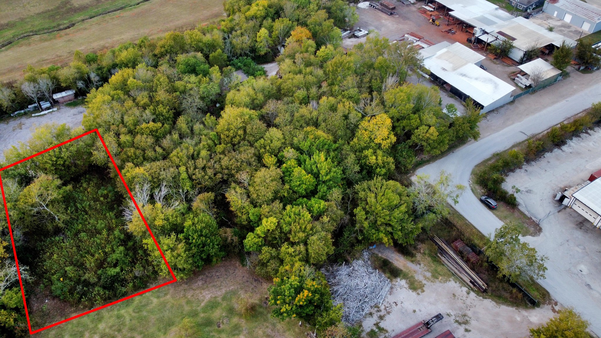 0 12th Street La Porte, TX 77571 - Photo 3 of 9 an aerial view of a house with a yard and garden