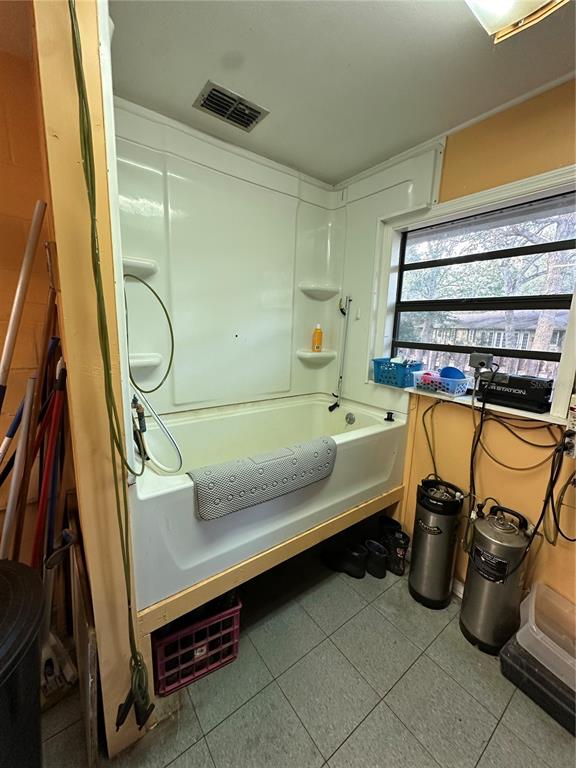 24392 Lanark Road Brooksville, FL 34601 - Photo 18 of 58 a bathroom with a sink and a mirror