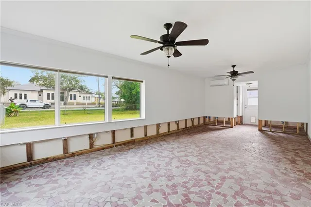 a house view with a backyard space and garden
