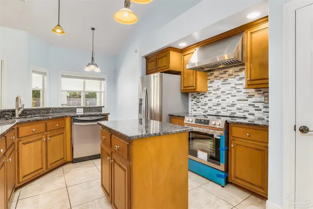 a view of a kitchen cabinets and wooden floor