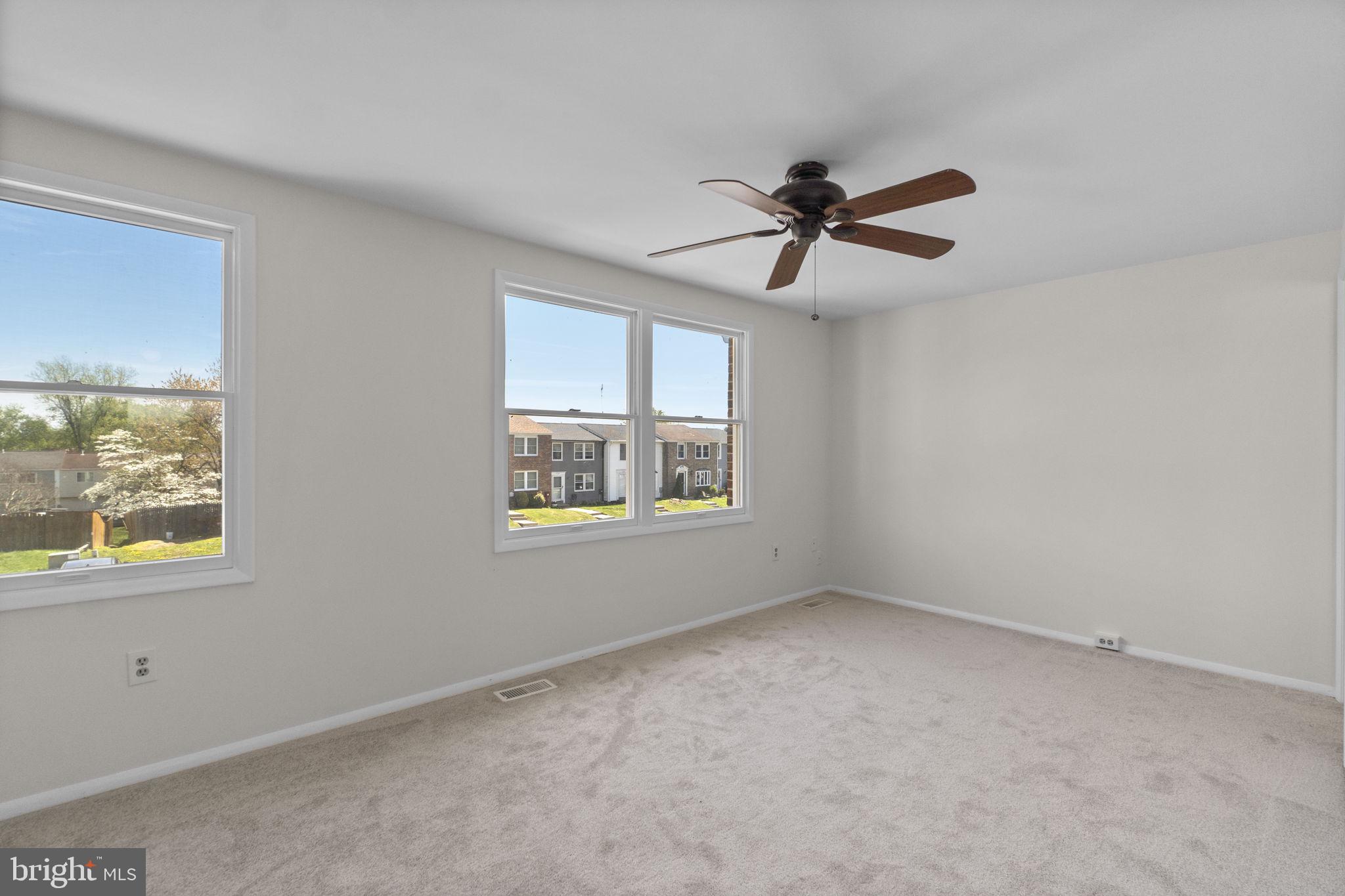 1715 Country Court Frederick, MD 21702 - Photo 11 of 31 a view of an empty room with a window