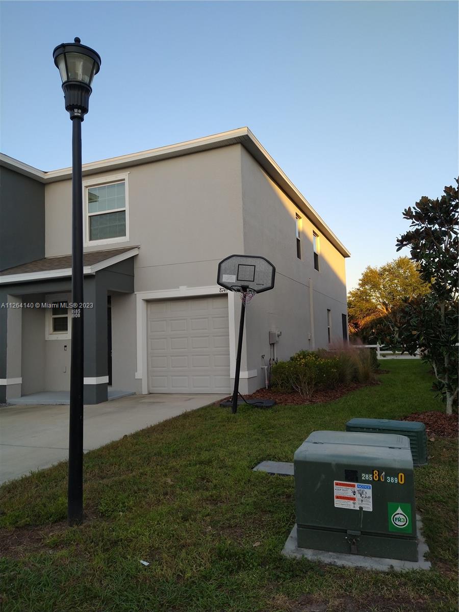 8749 Falling Blue Place Riverview, FL 33578 - Photo 1 of 51 a front view of a house with garden
