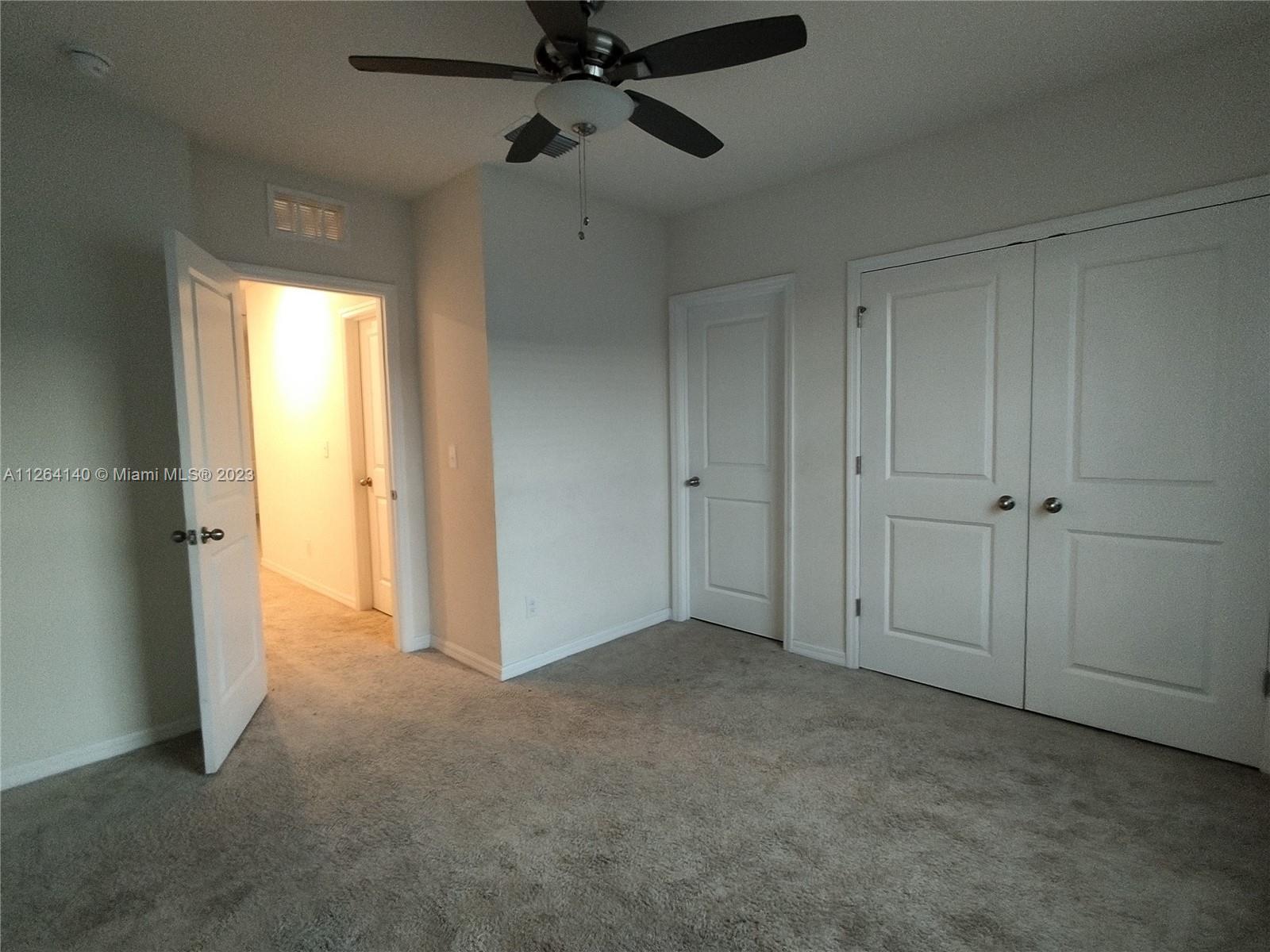 8749 Falling Blue Place Riverview, FL 33578 - Photo 21 of 51 a view of empty room with ceiling fan