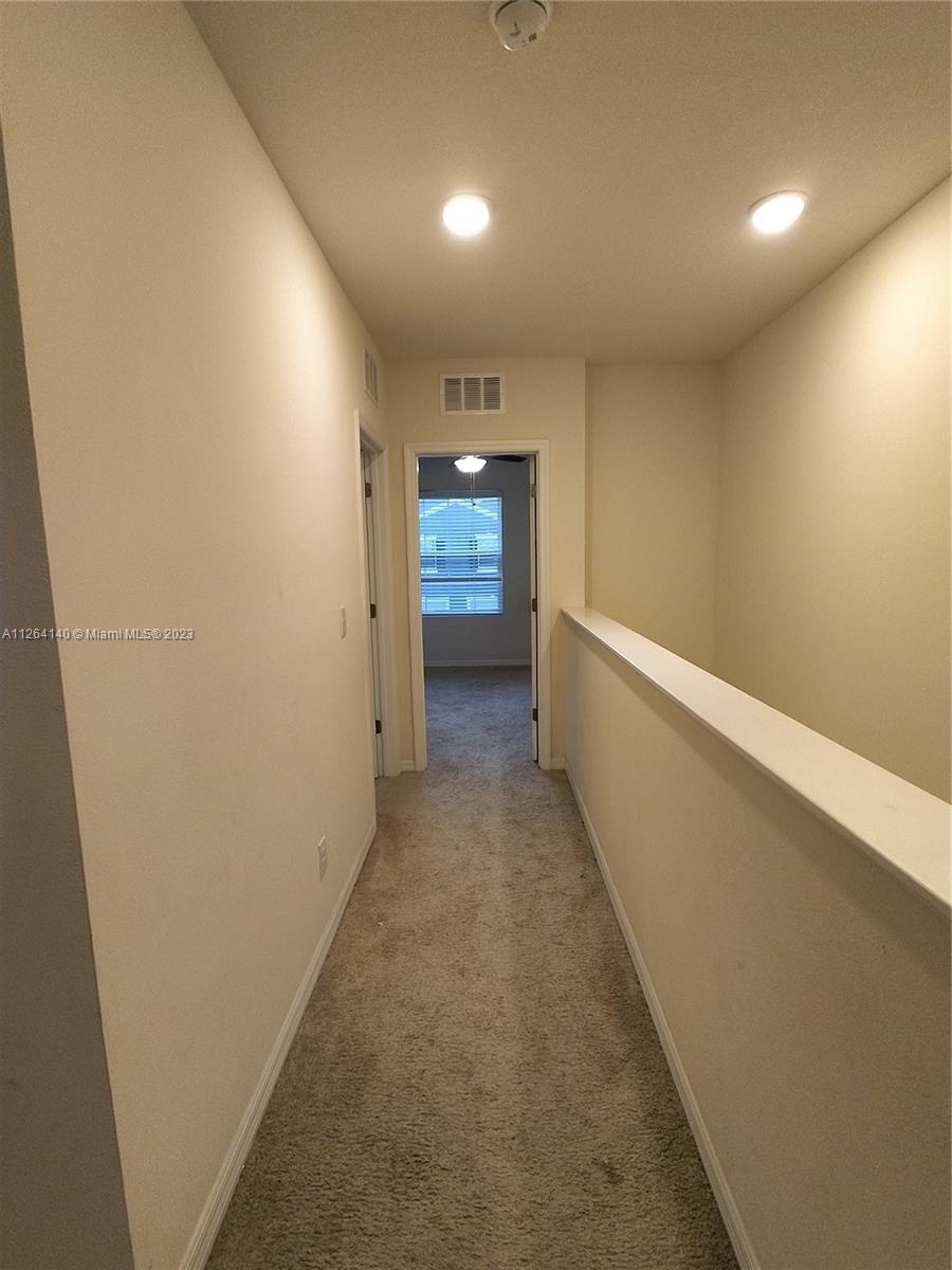 8749 Falling Blue Place Riverview, FL 33578 - Photo 29 of 51 a view of hallway with stairs