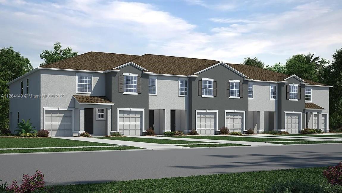 8749 Falling Blue Place Riverview, FL 33578 - Photo 3 of 51 a front view of a house with a yard