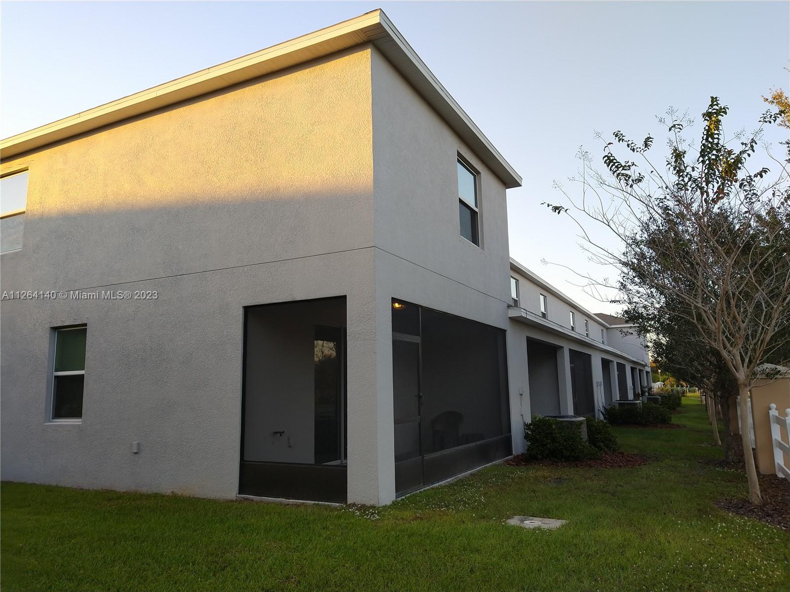 8749 Falling Blue Place Riverview, FL 33578 - Photo 46 of 51 a view of a house with a backyard