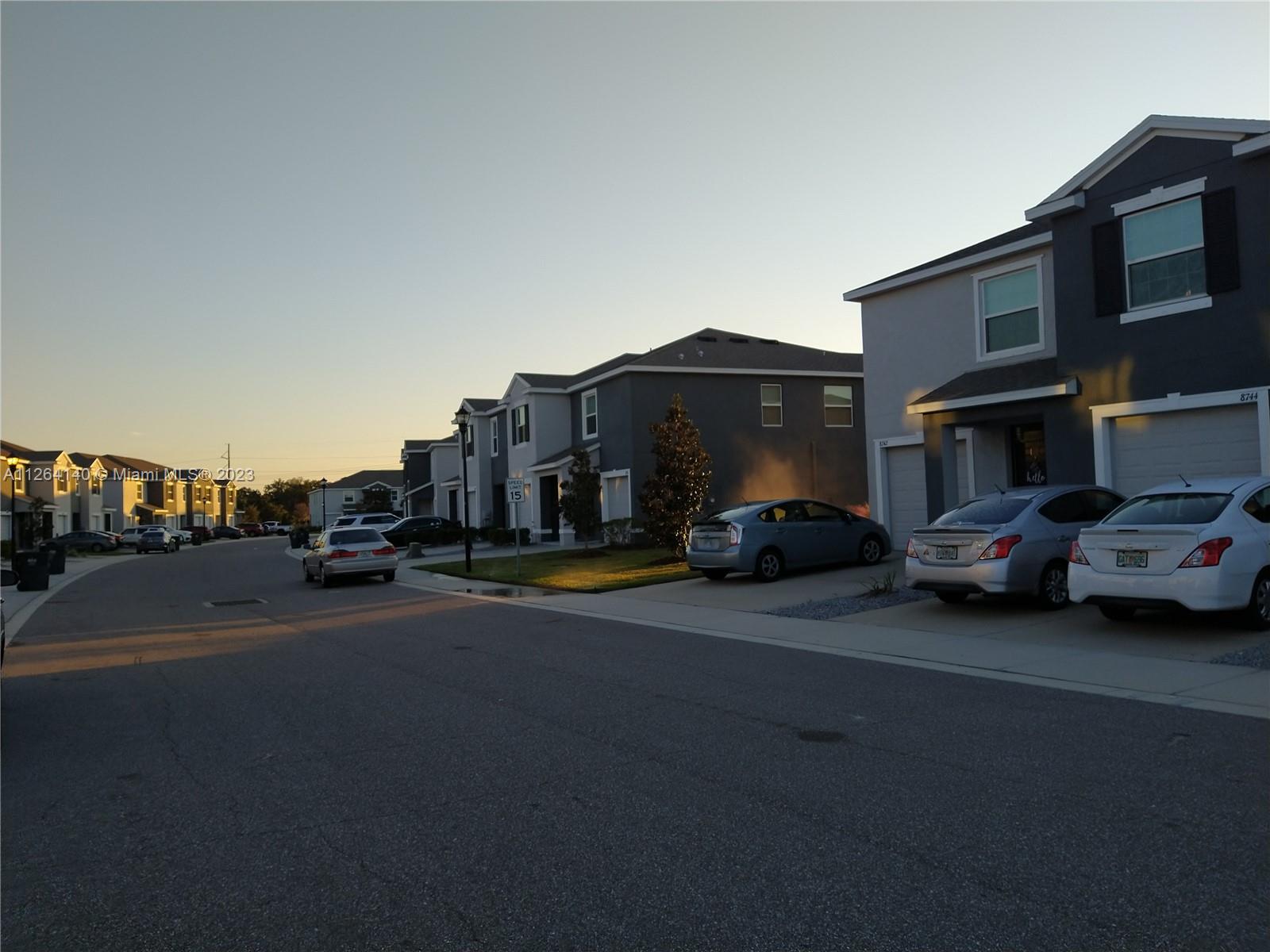 8749 Falling Blue Place Riverview, FL 33578 - Photo 50 of 51 a car parked in front of a house