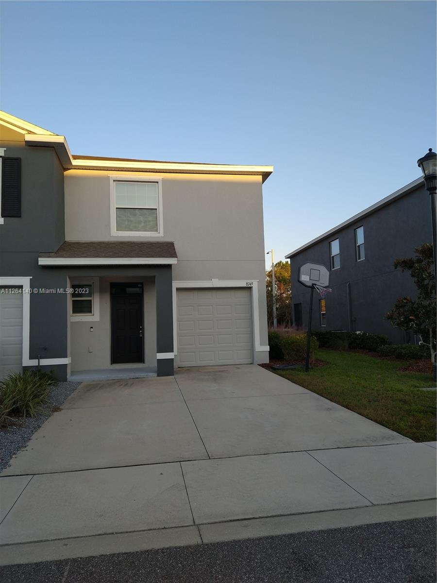 8749 Falling Blue Place Riverview, FL 33578 - Photo 5 of 51 a front view of a house with yard