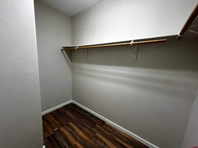 a view of a room with racks on the wall