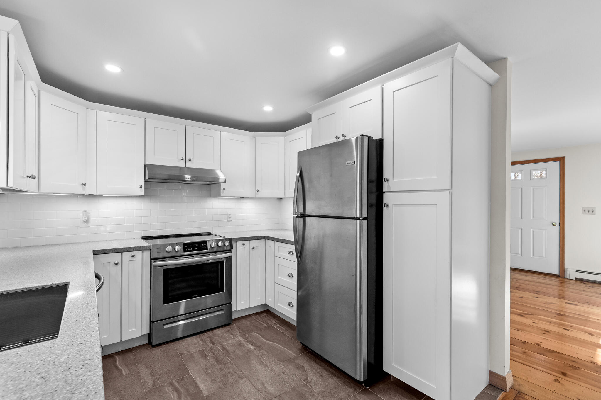 20 Stone Court Eastham, MA 02642 - Photo 12 of 31 a kitchen with a refrigerator sink and cabinets