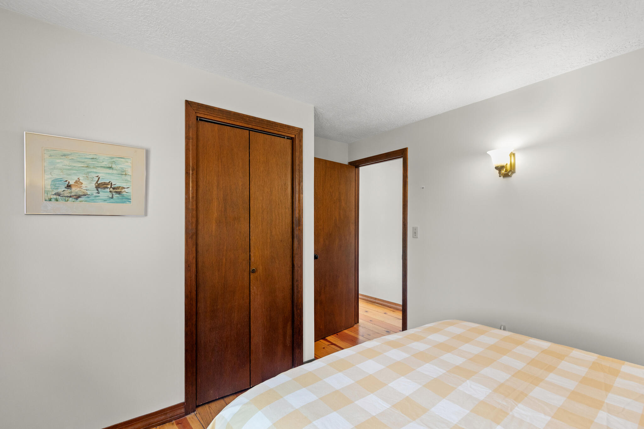 20 Stone Court Eastham, MA 02642 - Photo 21 of 31 a bedroom with a bed and a window
