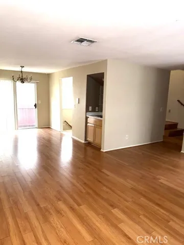 a view of a kitchen with a sink and a stove