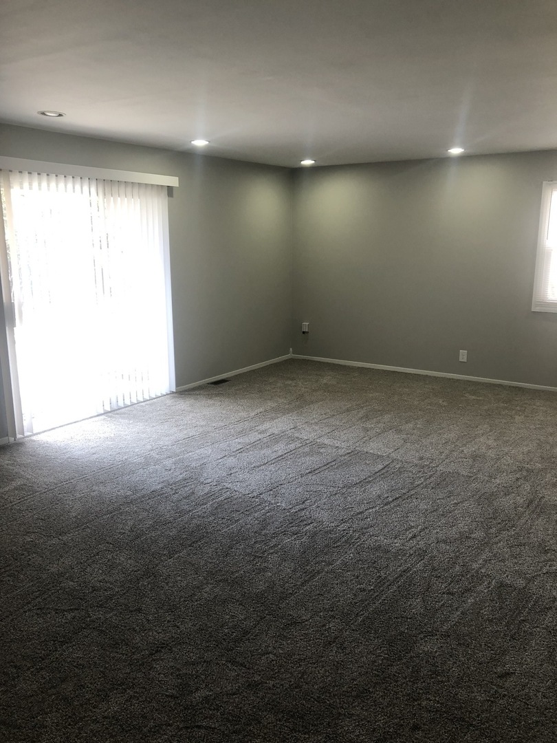 167 Thornhurst Road Bolingbrook, IL 60440 - Photo 11 of 20 an empty room with a natural light