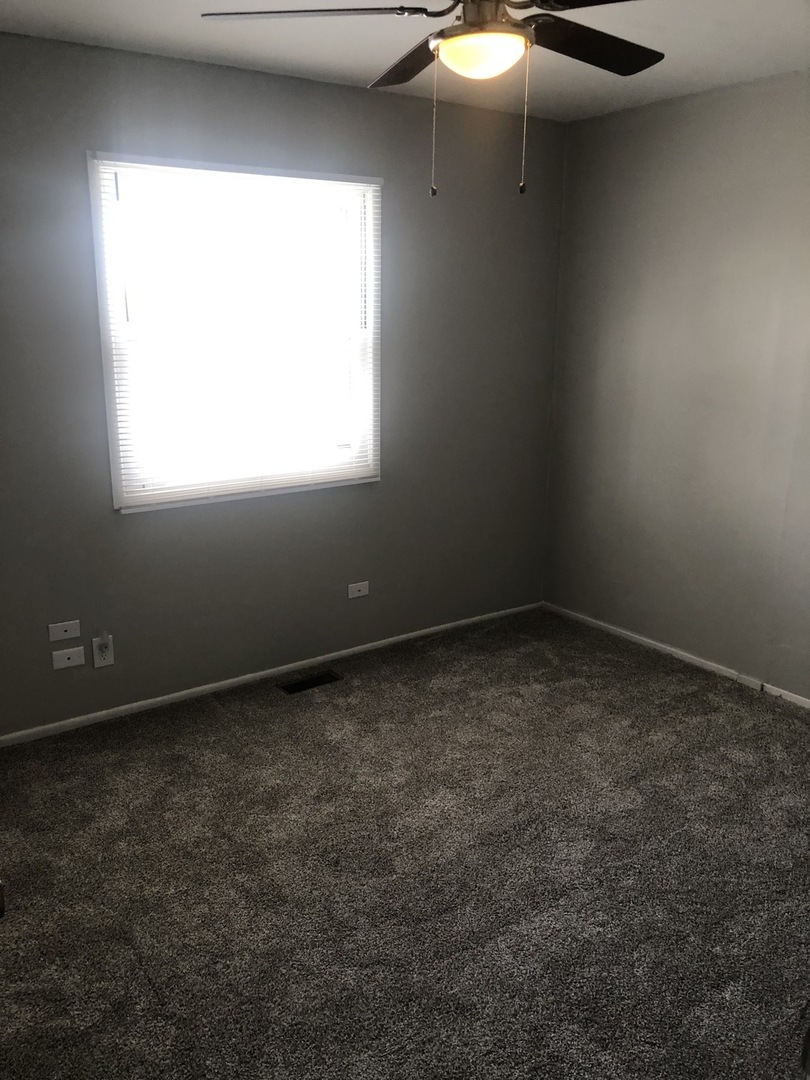 167 Thornhurst Road Bolingbrook, IL 60440 - Photo 15 of 20 a view of an empty room and window