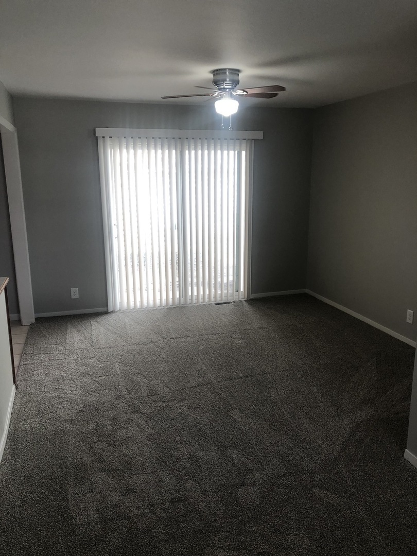 167 Thornhurst Road Bolingbrook, IL 60440 - Photo 2 of 20 a view of an empty room with a window