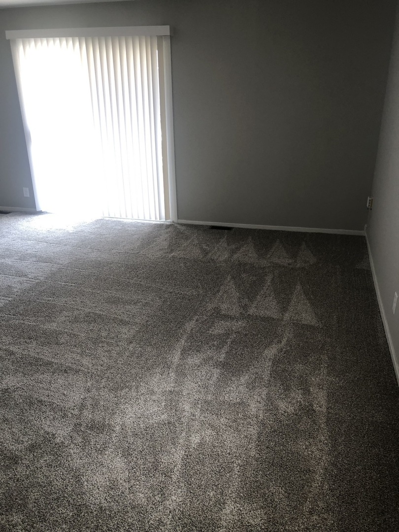 167 Thornhurst Road Bolingbrook, IL 60440 - Photo 8 of 20 a view of an empty room and window