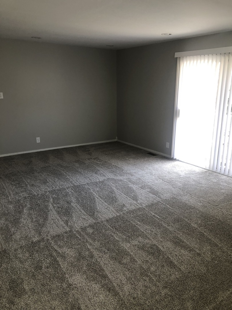 167 Thornhurst Road Bolingbrook, IL 60440 - Photo 10 of 20 a view of an empty room and window