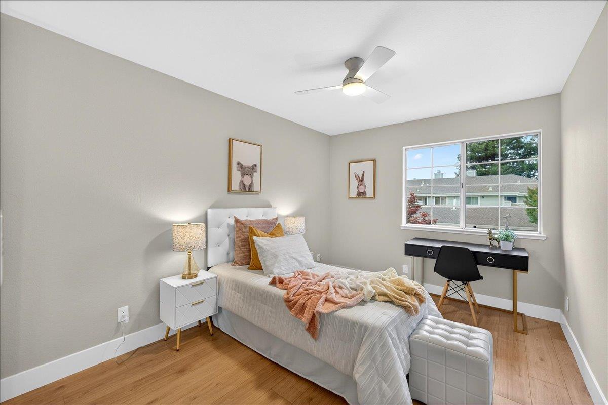 244 Rachael Place Pleasanton, CA 94566 - Photo 13 of 24 a bedroom with a bed and a table