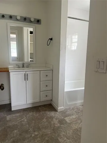 a view of a yard with a bench