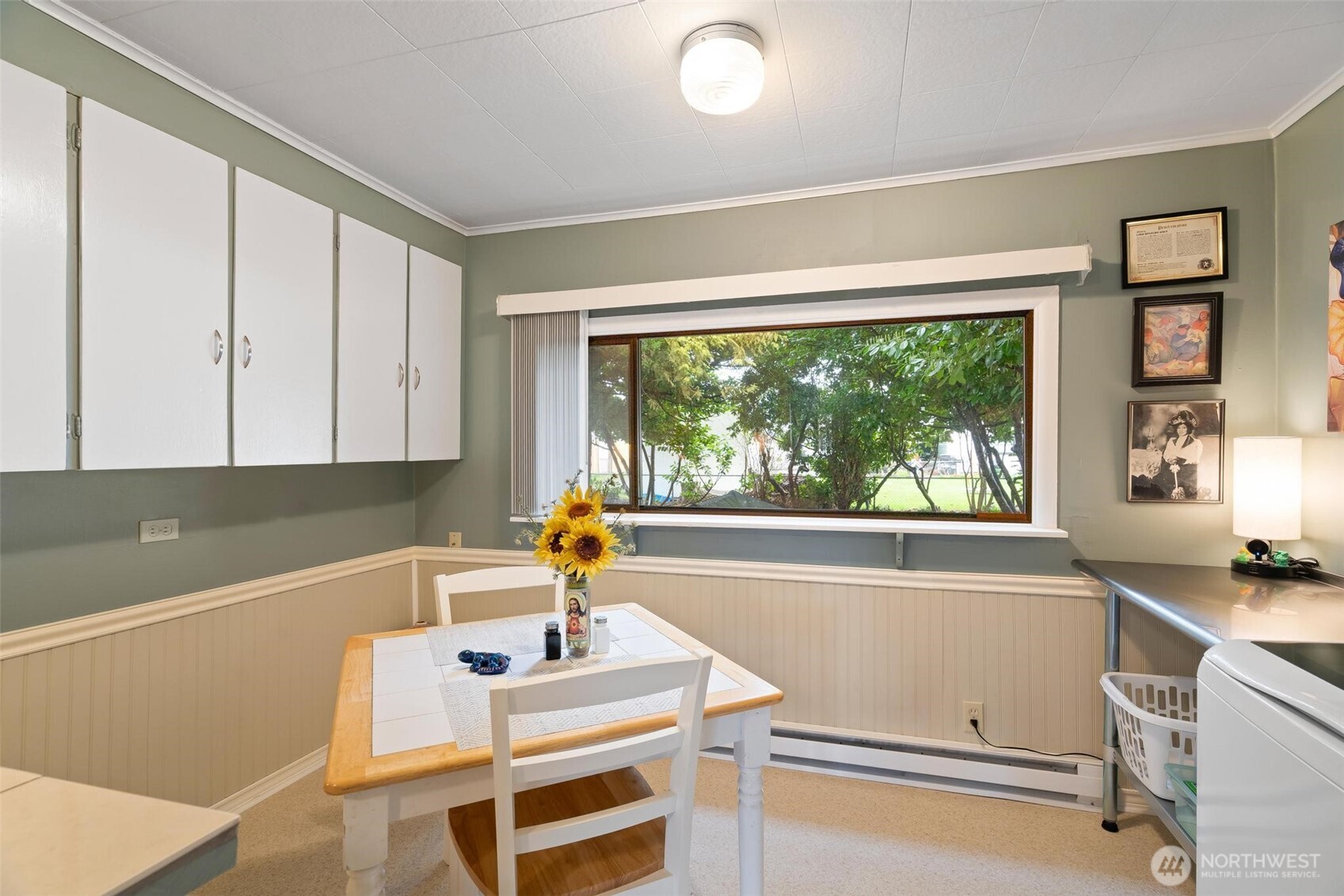 211 30th Street Hoquiam, WA 98550 - Photo 12 of 24 a kitchen with a sink and a large window