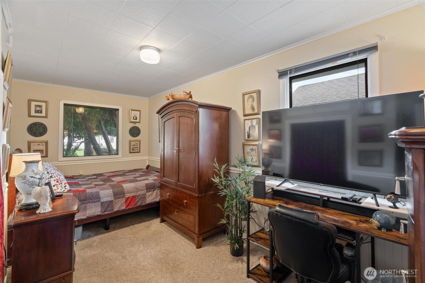 211 30th Street Hoquiam, WA 98550 - Photo 13 of 24 a bedroom with furniture and windows