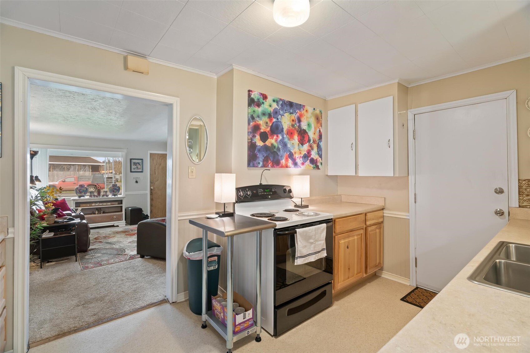 211 30th Street Hoquiam, WA 98550 - Photo 10 of 24 a view of kitchen with stainless steel appliances granite countertop a stove and a sink