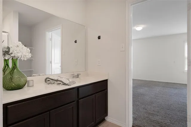 a view of empty room with windows