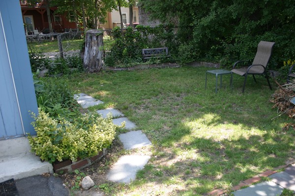 526 Centre Street, Unit 3 Boston, MA 02130 - Photo 15 of 15 a view of a garden with a bench in garden