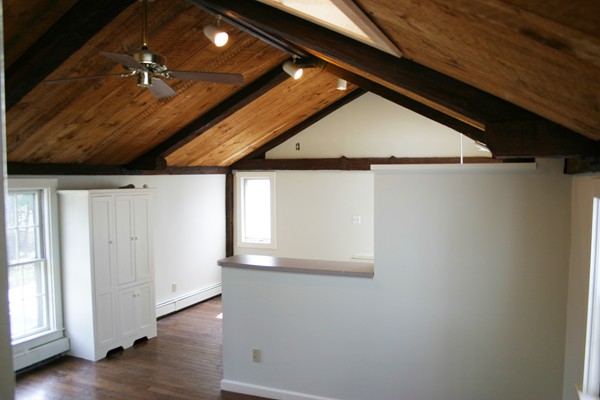 526 Centre Street, Unit 3 Boston, MA 02130 - Photo 3 of 15 a view of a hallway with wooden floor