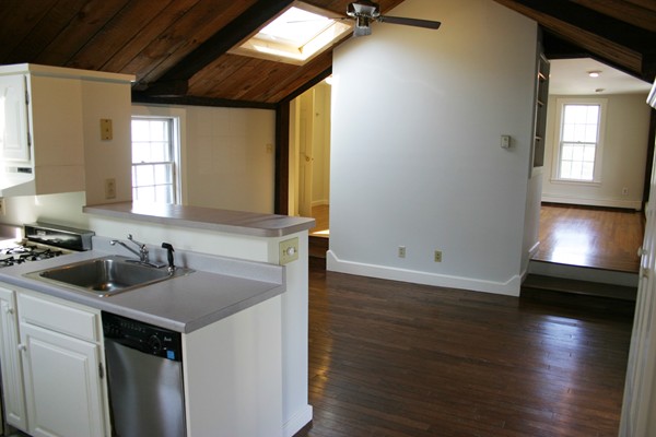 526 Centre Street, Unit 3 Boston, MA 02130 - Photo 7 of 15 a kitchen with a sink appliances and cabinets