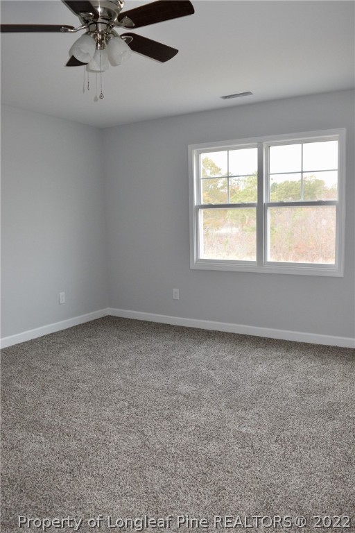 263 McMillan Siding Road Parkton, NC 28371 - Photo 8 of 15 an empty room with a window