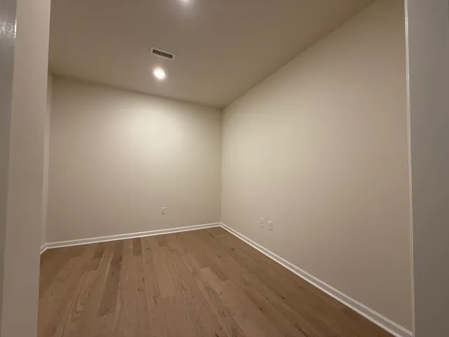 a bathroom with a shower and a bath tub